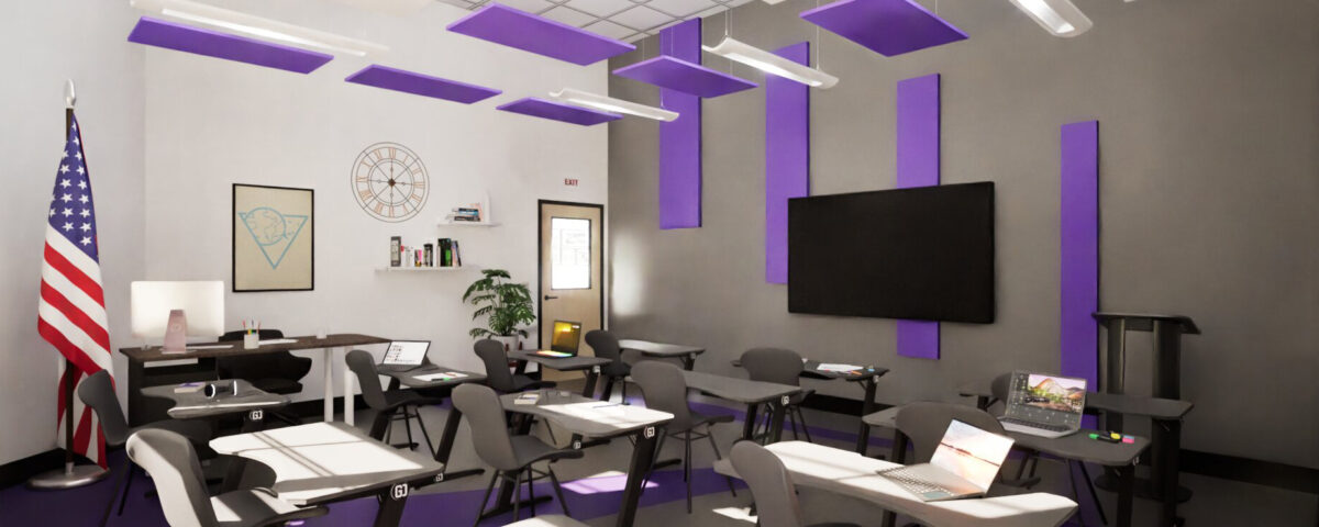 Interior of Christian Brothers Academy classroom with gray and black desks, gray walls, white ceiling, and violet panels.
