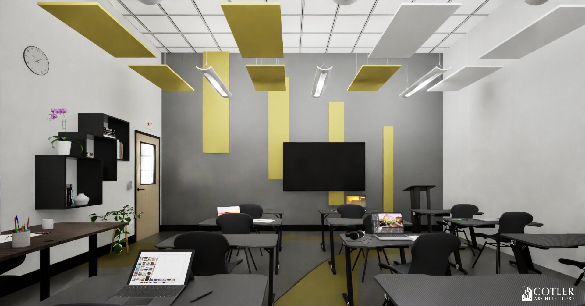 Interior of Christian Brothers Academy classroom with gray and black desks, gray walls, white ceiling, and yellow panels.