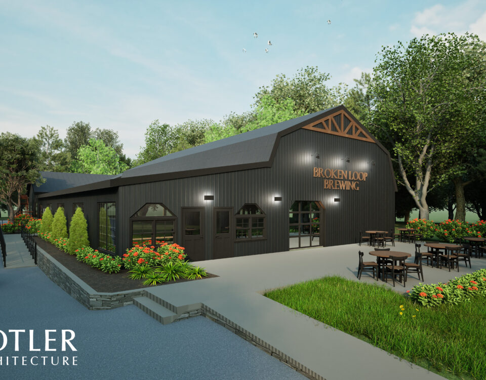 Rendering of Broken Loop Brewing Co., formerly Yonder Farms. Building has dark, vertical siding and is in the shape and style of a barn. Seating area outside with greenery and a blue sky.